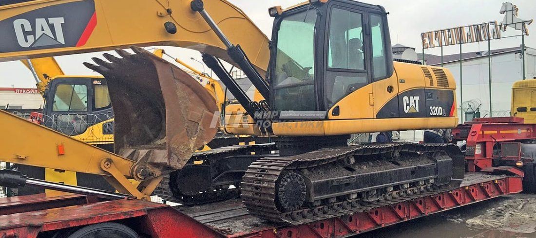 экскаватор CAT 320 на трале